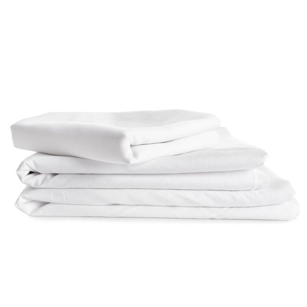 Set with stacks of clean bed linen on white background. Banner d